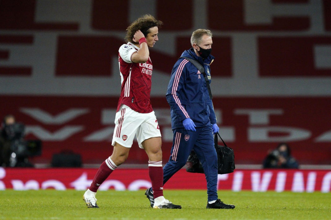 LONDON, ENGLAND: David Luiz of Arsenal leaves the pitch injured during the Premier League match between Arsenal and Leicester City at Emirates Stadium on October 25, 2020. (Photo by Will Oliver - Pool/Getty Images)