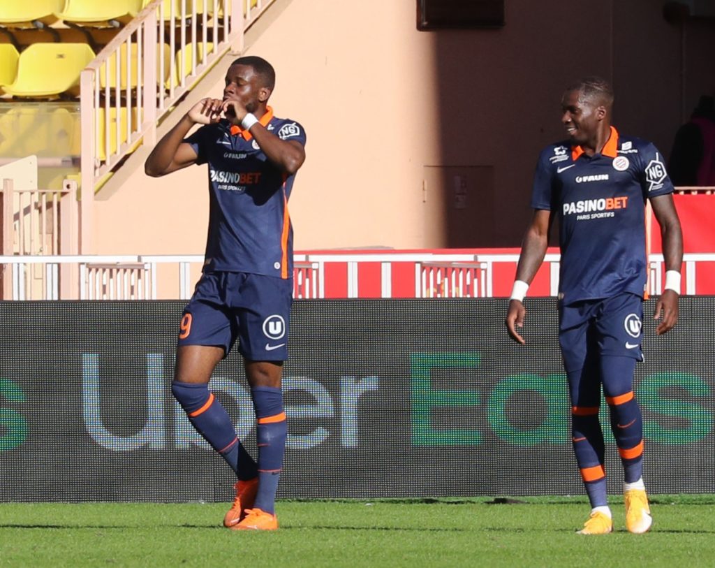 Montpellier's Stephy Mavididi (C) celebrates after scoring a goal during the French L1 football match between AS Monaco vs Montpellier Herault SC at the "Louis II Stadium" in Monaco on October 18, 2020. (Photo by VALERY HACHE/AFP via Getty Images)