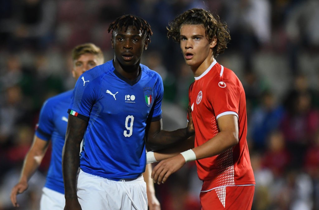 VICENZA, ITALY - OCTOBER 15: Kean Moise of Italy U21 competes with Omar Rekik of Tunisia U21 during the International Friendly match between Italy U21 and Tunisia U21 at Stadio Romeo Menti on October 15, 2018 in Vicenza, Italy. (Photo by Alessandro Sabattini/Getty Images)
