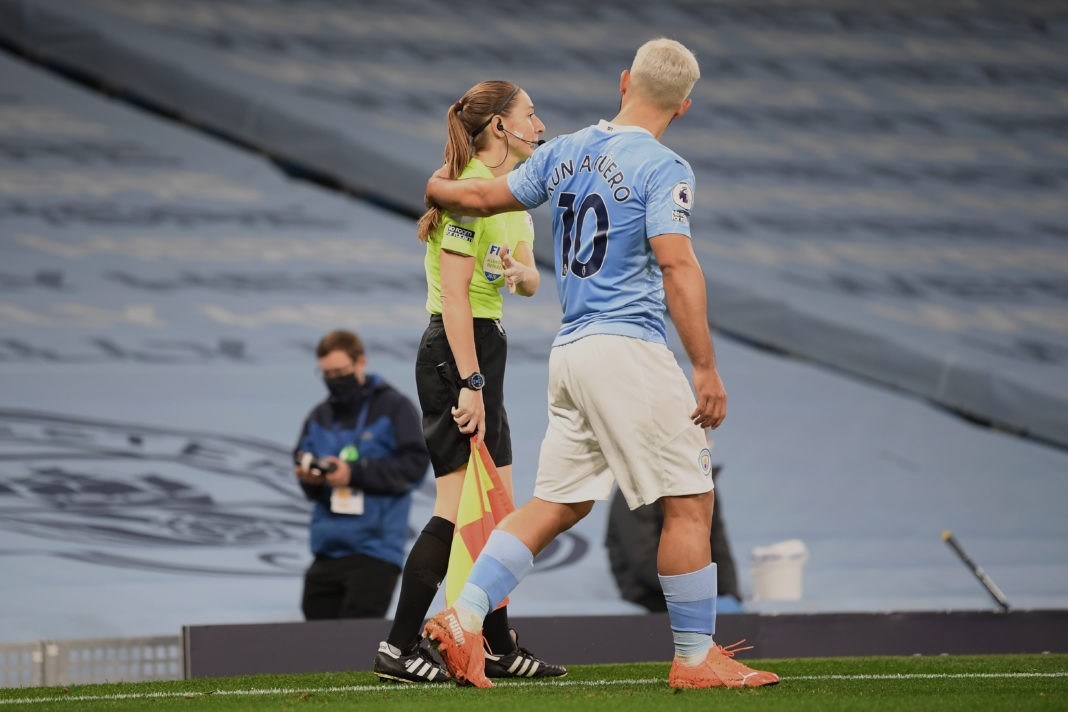 MANCHESTER, ENGLAND - OCTOBER 17: Assistant referee Sian Massey-Ellis and Sergio Aguero of Manchester City during the Premier League match between Manchester City and Arsenal at Etihad Stadium on October 17, 2020 in Manchester, England. Sporting stadiums around the UK remain under strict restrictions due to the Coronavirus Pandemic as Government social distancing laws prohibit fans inside venues resulting in games being played behind closed doors. (Photo by Michael Regan/Getty Images)