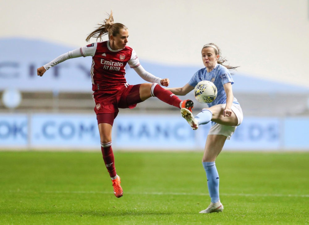 MANCHESTER, ENGLAND - OCTOBER 01: Noelle Maritz of Arsenal FC battles for possession with Rose Lavelle of Manchester City during the Vitality Women's FA Cup Semi Final match between Manchester City and Arsenal on October 01, 2020 in Manchester, England. Sporting stadiums around the UK remain under strict restrictions due to the Coronavirus Pandemic as Government social distancing laws prohibit fans inside venues resulting in games being played behind closed doors. (Photo by Catherine Ivill/Getty Images)