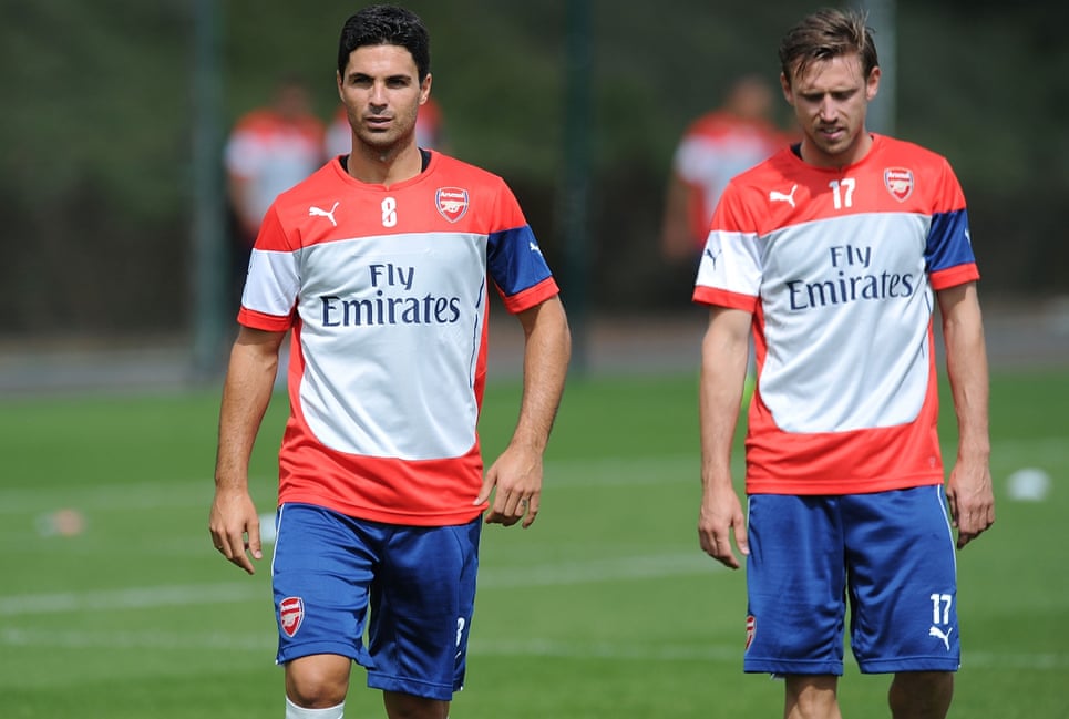 Mikel Arteta and Nacho Monreal during an Arsenal training session in 2014. (Photograph: Stuart MacFarlane / Arsenal FC via Getty Images)