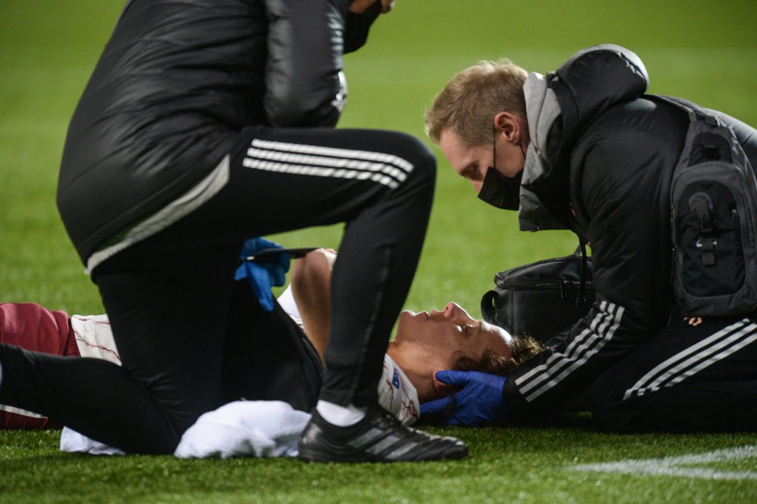 MOLDE, NORWAY: David Luiz of Arsenal receives treatment after a clash of heads during the UEFA Europa League Group B stage match between Molde FK and Arsenal FC at Molde Stadion on November 26, 2020. Photo by Erik Birkeland/MB Media