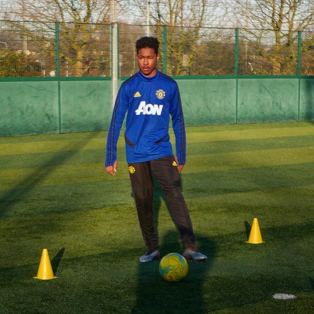 Reuell Walters during his time with Manchester United (Photo via Round World FA on Instagram)