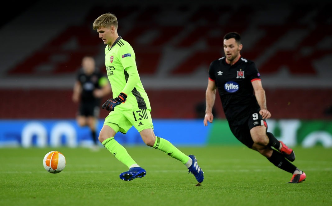 LONDON, ENGLAND: Runar Alex Runarsson of Arsenal is challenged by Patrick Hoban of Dundalk during the UEFA Europa League Group B stage match between Arsenal FC and Dundalk FC at Emirates Stadium on October 29, 2020. (Photo by Mike Hewitt/Getty Images)