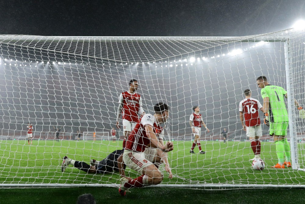 LONDON, ENGLAND - NOVEMBER 08: Arsenal players react as Ollie Watkins of Aston Villa scores his team's second goal during the Premier League match between Arsenal and Aston Villa at Emirates Stadium on November 08, 2020 in London, England. Sporting stadiums around the UK remain under strict restrictions due to the Coronavirus Pandemic as Government social distancing laws prohibit fans inside venues resulting in games being played behind closed doors. (Photo by Richard Heathcote/Getty Images)