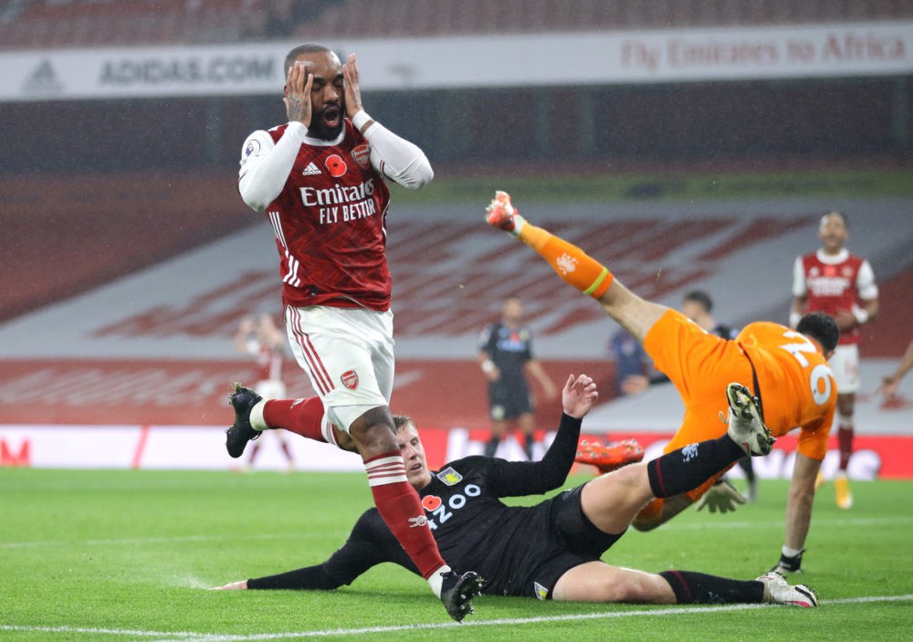LONDON, ENGLAND - NOVEMBER 08: Alexandre Lacazette of Arsenal reacts after a missed chance during the Premier League match between Arsenal and Aston Villa at Emirates Stadium on November 08, 2020 in London, England. Sporting stadiums around the UK remain under strict restrictions due to the Coronavirus Pandemic as Government social distancing laws prohibit fans inside venues resulting in games being played behind closed doors. (Photo by Richard Heathcote/Getty Images)