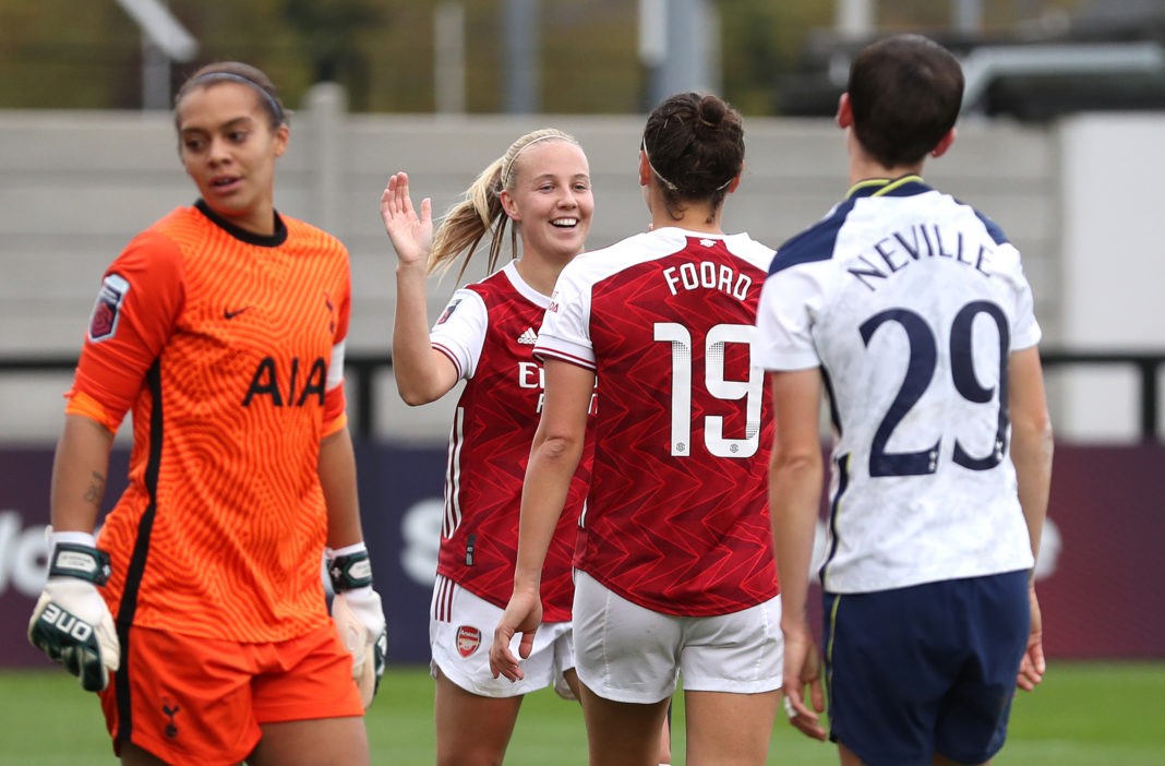 BOREHAMWOOD, ENGLAND - OCTOBER 18: Caitlin Foord of Arsenal celebrates with teammates Beth Mead after scoring her team's sixth goal during the Barclays FA Women's Super League match between Arsenal Women and Tottenham Hotspur Women at Meadow Park on October 18, 2020 in Borehamwood, England. Sporting stadiums around the UK remain under strict restrictions due to the Coronavirus Pandemic as Government social distancing laws prohibit fans inside venues resulting in games being played behind closed doors. (Photo by Catherine Ivill/Getty Images)