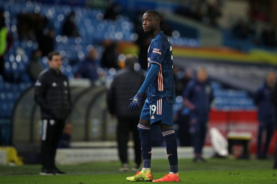 Arsenal's French-born Ivorian midfielder Nicolas Pepe leaves the pitch after being sent off after clashing with Leeds United's Macedonian midfielder Ezgjan Alioski during the English Premier League football match between Leeds United and Arsenal at Elland Road in Leeds, northern England on November 22, 2020. (Photo by MOLLY DARLINGTON / POOL / AFP)