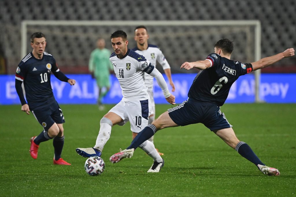 Serbia's midfielder Dusan Tadic (C) fights for the ball with Scotland's midfielder Callum McGregor (L) and Scotland's midfielder Kieran Tierney during the Euro 2020 play-off qualification football match between Serbia and Scotland at the Red Star Stadium in Belgrade on November 12, 2020. (Photo by ANDREJ ISAKOVIC/AFP via Getty Images)