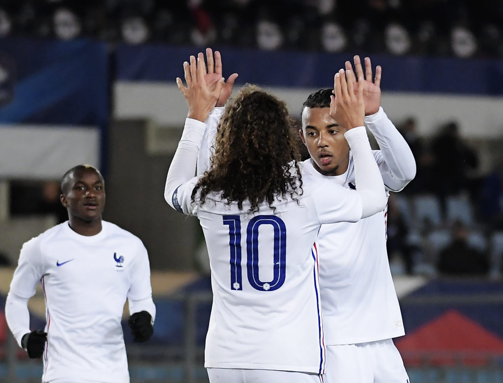 France's defender Jules Kounde (R) jubilates with France's midfielder Matteo Guendouzi during the U21 European Championships qualification football match France vs Slovakia on October 12, 2020 at the Meinau stadium in Strasbourg, eastern France. (Photo by FREDERICK FLORIN / AFP)