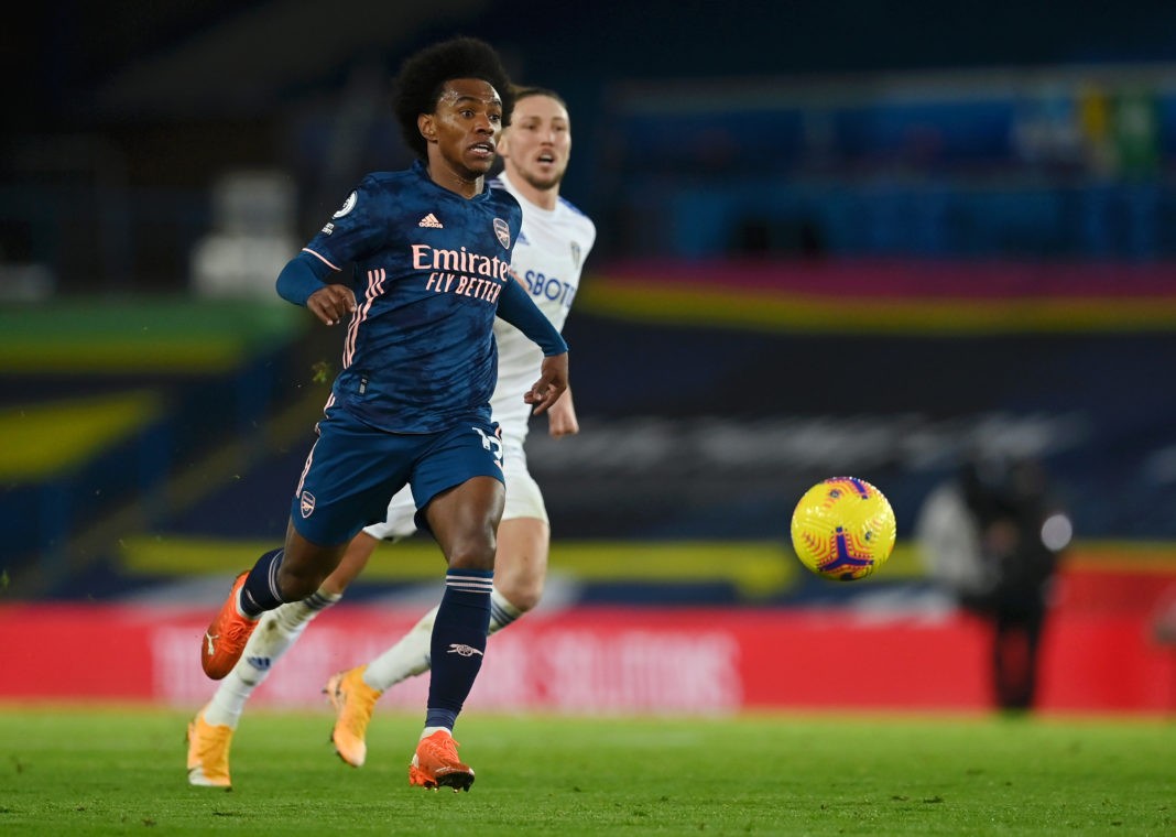 LEEDS, ENGLAND - NOVEMBER 22: Willian of Arsenal looks to break past Luke Ayling of Leeds United during the Premier League match between Leeds United and Arsenal at Elland Road on November 22, 2020 in Leeds, England. Sporting stadiums around the UK remain under strict restrictions due to the Coronavirus Pandemic as Government social distancing laws prohibit fans inside venues resulting in games being played behind closed doors. (Photo by Paul Ellis - Pool/Getty Images)