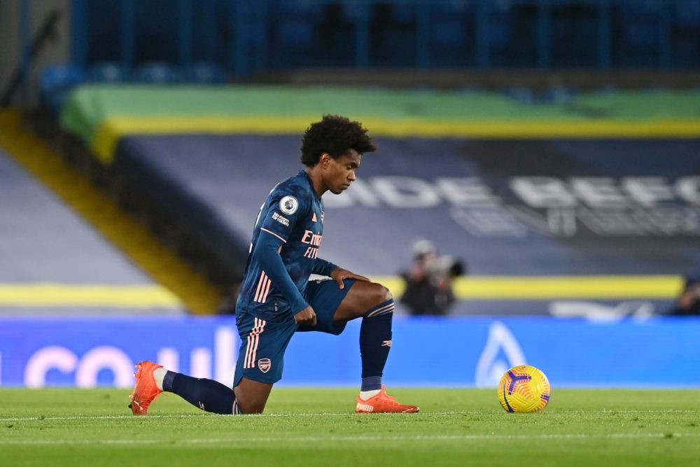 LEEDS, ENGLAND - NOVEMBER 22: Willian of Arsenal takes a knee in support of the Black Lives Matter movement ahead of the Premier League match between Leeds United and Arsenal at Elland Road on November 22, 2020 in Leeds, England. Sporting stadiums around the UK remain under strict restrictions due to the Coronavirus Pandemic as Government social distancing laws prohibit fans inside venues resulting in games being played behind closed doors. (Photo by Paul Ellis - Pool/Getty Images)