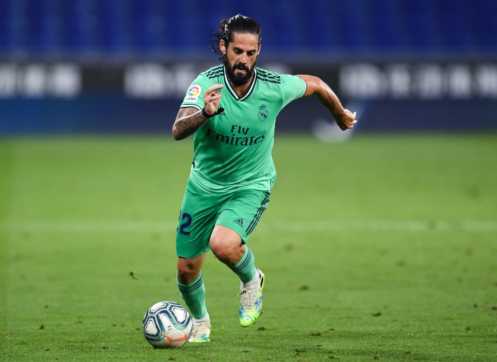 BARCELONA, SPAIN - JUNE 28: Isco of Real Madrid CF runs with the ball during the Liga match between RCD Espanyol and Real Madrid CF at RCDE Stadium on June 28, 2020 in Barcelona, Spain. (Photo by David Ramos/Getty Images)