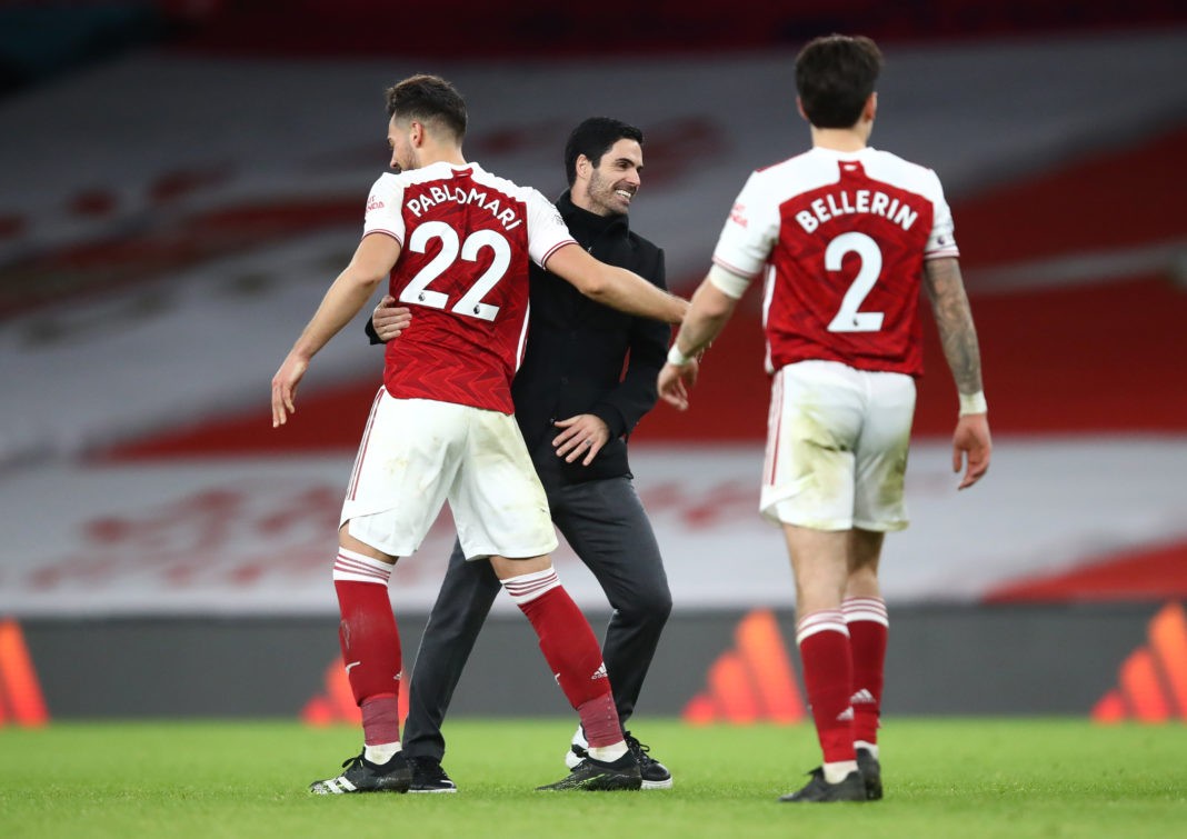 LONDON, ENGLAND: Mikel Arteta, Manager of Arsenal and Pablo Mari of Arsenal celebrate following their team's victory in the Premier League match between Arsenal and Chelsea at Emirates Stadium on December 26, 2020. (Photo by Julian Finney/Getty Images)