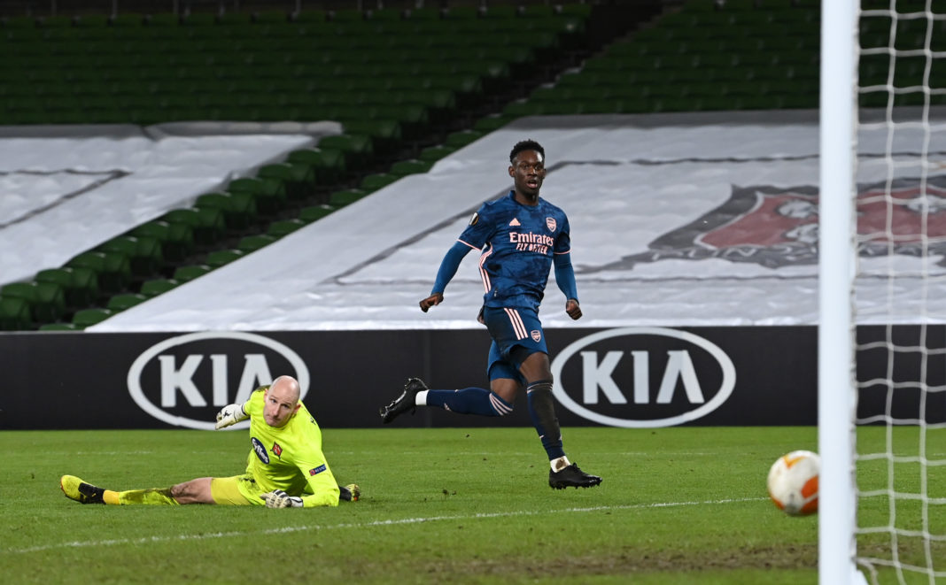 DUBLIN, IRELAND: Folarin Balogun of Arsenal scores their sides fourth goal past Gary Rogers of Dundalk during the UEFA Europa League Group B stage match between Dundalk FC and Arsenal FC at Aviva Stadium on December 10, 2020. (Photo by Charles McQuillan/Getty Images)