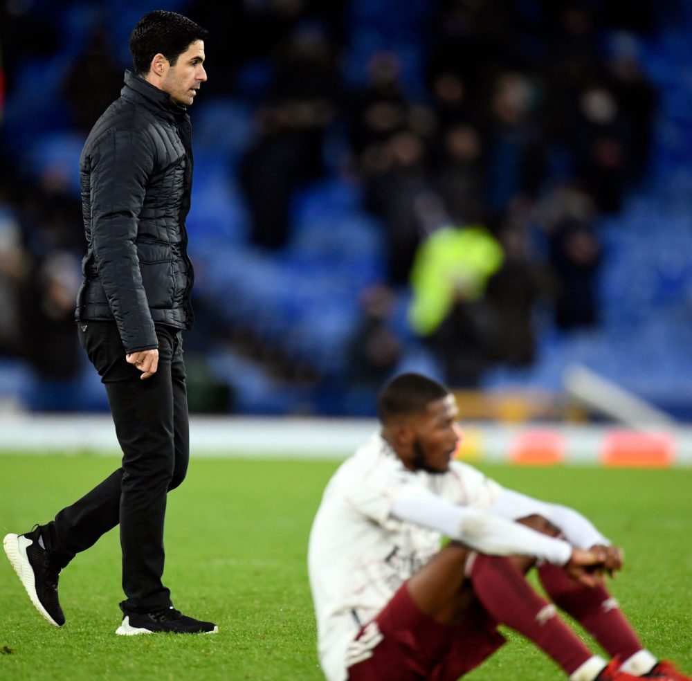 Arsenal's Spanish manager Mikel Arteta (L) leaves after the English Premier League football match between Everton and Arsenal at Goodison Park in Liverpool, north west England on December 19, 2020. - Everton won 2-1. (Photo by PETER POWELL / POOL / AFP)