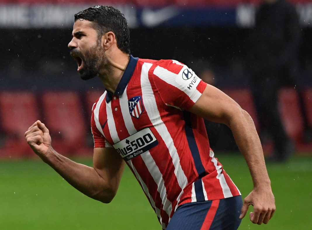 Atletico Madrid's Spanish forward Diego Costa celebrates his goal during the Spanish league football match between Club Atletico de Madrid and Elche CF at the Wanda Metropolitano stadium in Madrid on December 19, 2020. (Photo by OSCAR DEL POZO / AFP) (Photo by OSCAR DEL POZO/AFP via Getty Images)