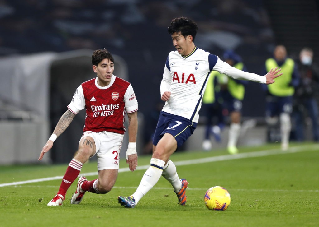 LONDON, ENGLAND - DECEMBER 06: Hector Bellerin of Arsenal is put under pressure by Son Heung-Min of Tottenham Hotspur during the Premier League match between Tottenham Hotspur and Arsenal at Tottenham Hotspur Stadium on December 06, 2020 in London, England. A limited number of fans (2000) are welcomed back to stadiums to watch elite football across England. This was following easing of restrictions on spectators in tiers one and two areas only. (Photo by Paul Childs - Pool/Getty Images)