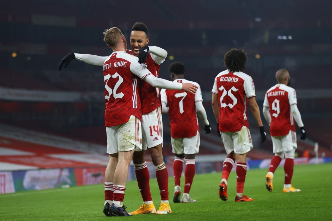 LONDON, ENGLAND - JANUARY 09: Emile Smith Rowe of Arsenal celebrates with teammate Pierre-Emerick Aubameyang after scoring their sides first goal during the FA Cup Third Round match between Arsenal and Newcastle United at Emirates Stadium on January 09, 2021 in London, England. The match will be played without fans, behind closed doors as a Covid-19 precaution. (Photo by Julian Finney/Getty Images)