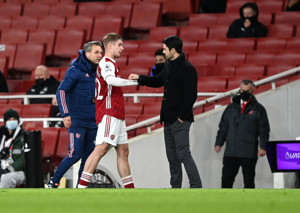 LONDON, ENGLAND - JANUARY 18: Emile Smith Rowe of Arsenal interacts with Mikel Arteta, Manager of Arsenal after being substituted off during the Premier League match between Arsenal and Newcastle United at Emirates Stadium on January 18, 2021 in London, England. Sporting stadiums around England remain under strict restrictions due to the Coronavirus Pandemic as Government social distancing laws prohibit fans inside venues resulting in games being played behind closed doors. (Photo by Shaun Botterill/Getty Images)