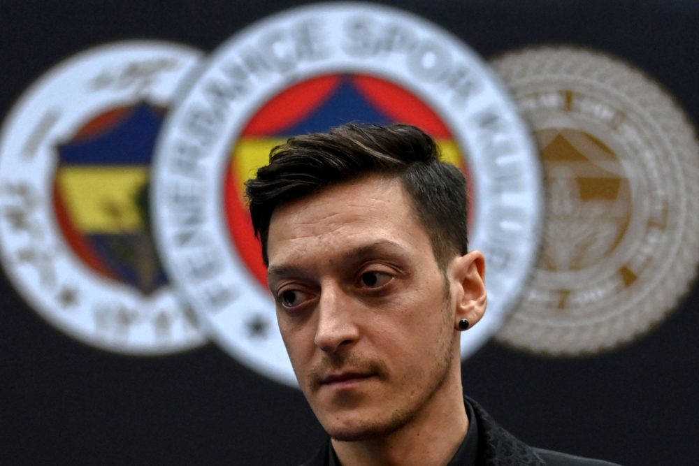 Arsenal's former German midfielder Mesut Ozil attends a signing cerenomy of his new contract with Turkish football club Fenerbahce at the Divan Faruk ilgaz facilities on January 27,2021 in Istanbul. (Photo by Ozan KOSE / AFP) (Photo by OZAN KOSE/AFP via Getty Images)