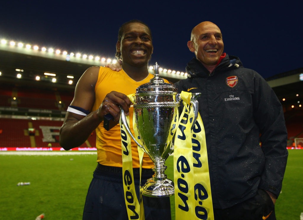 LIVERPOOL, ENGLAND - MAY 26: Arsenal Youth Head Coach Steve Bould and Captain Jay Emmanuel Thomas celebrate winning the FA Youth Cup during the second leg of the FA Youth Cup final sponsored by E.ON, between Liverpool and Arsenal at Anfield on May 26, 2009 in Liverpool, England. (Photo by Jamie McDonald/Getty Images)