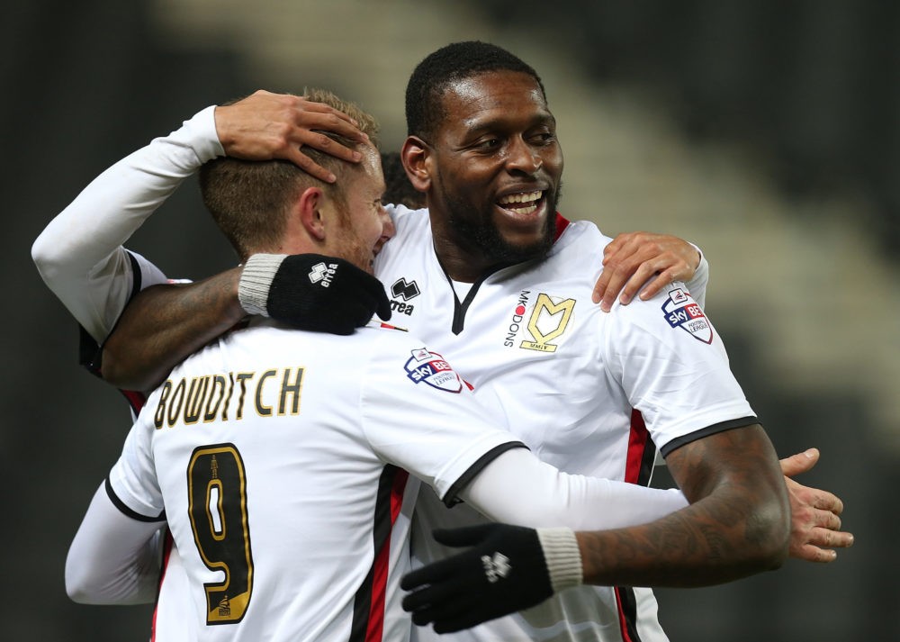 MILTON KEYNES, ENGLAND - FEBRUARY 09: Dean Bowditch of Milton Keynes Dons is congratulated by team mate Jay Emmanuel-Thomas after scoring his sides goal during the Sky Bet Championship match between Milton Keynes Dons and Middlesbrough at StadiumMK on February 9, 2016 in Milton Keynes, England. (Photo by Pete Norton/Getty Images)