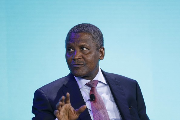 Aliko Dangote, president and chief executive officer of Dangote Group, speaks during a panel discussion at the Bloomberg New Economy Forum in Singapore, on Tuesday, Nov. 6, 2018. The New Economy Forum, organized by Bloomberg Media Group, a division of Bloomberg LP, aims to bring together leaders from public and private sectors to find solutions to the world's greatest challenges. Photographer: Justin Chin/Bloomberg via Getty Images