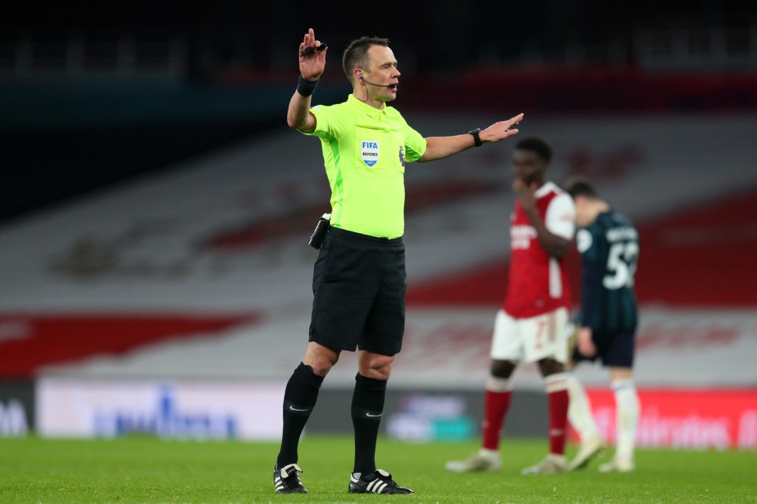 LONDON, ENGLAND: Referee, Stuart Attwell gestures during the Premier League match between Arsenal and Leeds United at Emirates Stadium on February 14, 2021. (Photo by Catherine Ivill/Getty Images)