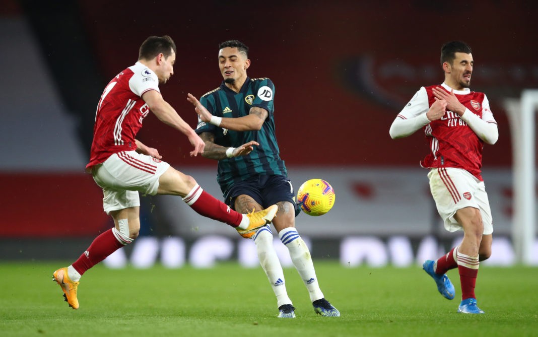 LONDON, ENGLAND: Cedric Soares of Arsenal is challenged by Raphinha of Leeds United during the Premier League match between Arsenal and Leeds United at Emirates Stadium on February 14, 2021. (Photo by Julian Finney/Getty Images)