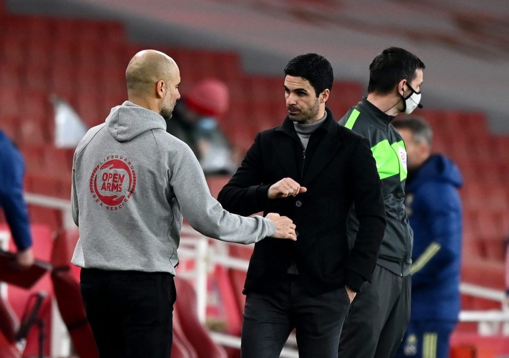 LONDON, ENGLAND - FEBRUARY 21: Pep Guardiola, Manager of Manchester City bumps fists with Mikel Arteta, Manager of Arsenal after the Premier League match between Arsenal and Manchester City at Emirates Stadium on February 21, 2021 in London, England. Sporting stadiums around the UK remain under strict restrictions due to the Coronavirus Pandemic as Government social distancing laws prohibit fans inside venues resulting in games being played behind closed doors. (Photo by Shaun Botterill/Getty Images)