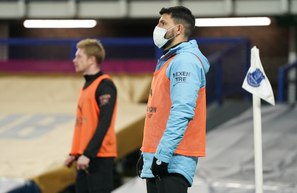 LIVERPOOL, ENGLAND: Sergio Aguero of Manchester City is seen wearing a face mask as he warms up at the side of the pitch during the Premier League match between Everton and Manchester City at Goodison Park on February 17, 2021. (Photo by Jon Super - Pool/Getty Images)