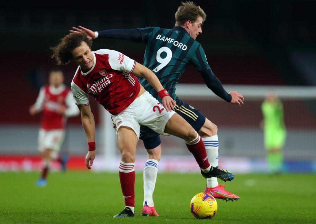 Arsenal's Brazilian defender David Luiz (L) and Leeds United's English striker Patrick Bamford compete during the English Premier League football match between Arsenal and Leeds United at the Emirates Stadium in London on February 14, 2021. (Photo by Catherine Ivill / POOL / AFP)