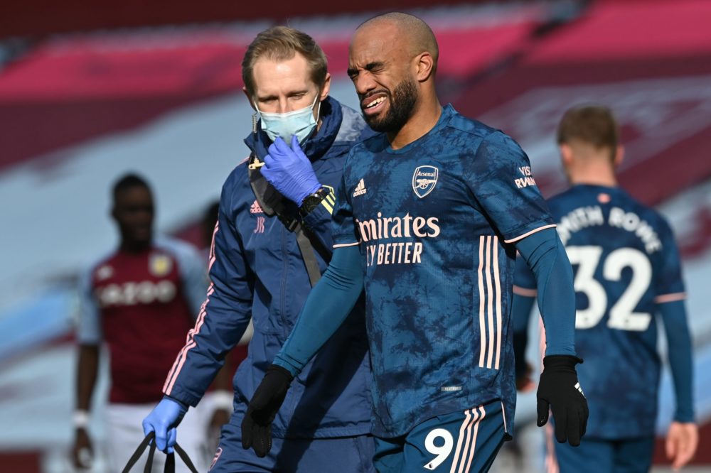 Alexandre Lacazette's contract is coming to an end: Arsenal's French striker Alexandre Lacazette receives medical attention during the English Premier League football match between Aston Villa and Arsenal at Villa Park in Birmingham, central England on February 6, 2021. (Photo by Shaun Botterill / POOL / AFP)
