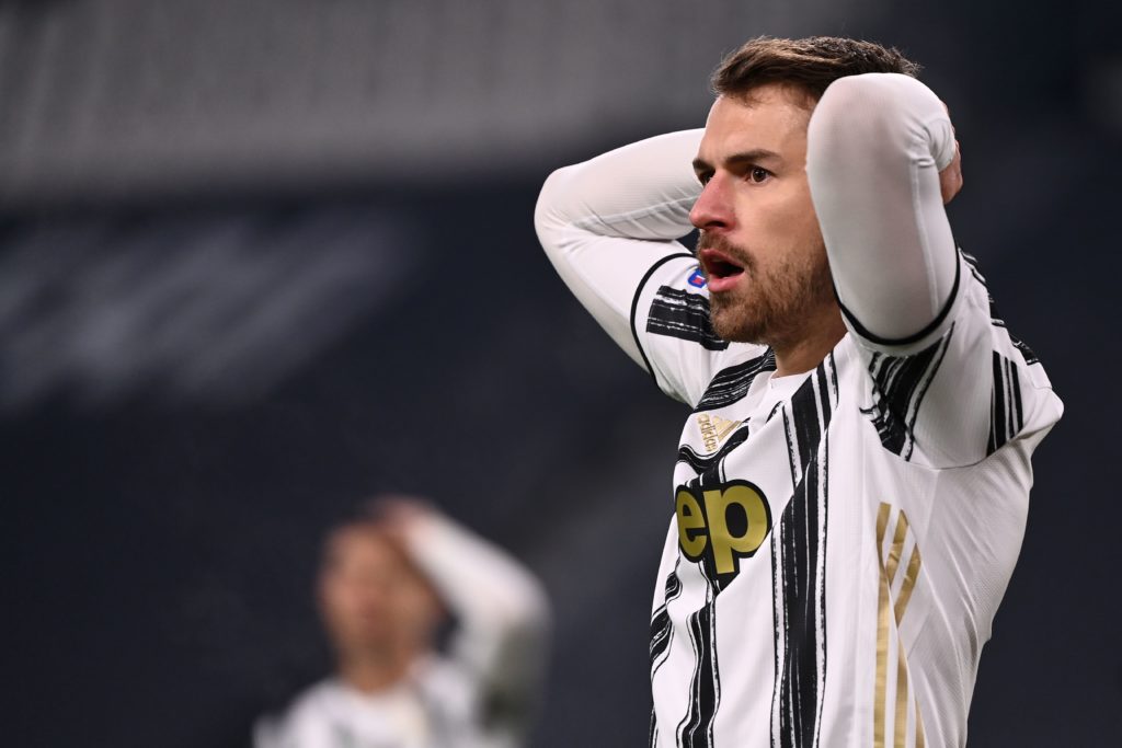 Juventus' Welsh midfielder Aaron Ramsey reacts after missing a goal opportunity during the Italian Serie A football match Juventus vs Udinese on January 3, 2021 at the Juventus stadium in Turin. (Photo by Marco BERTORELLO / AFP)