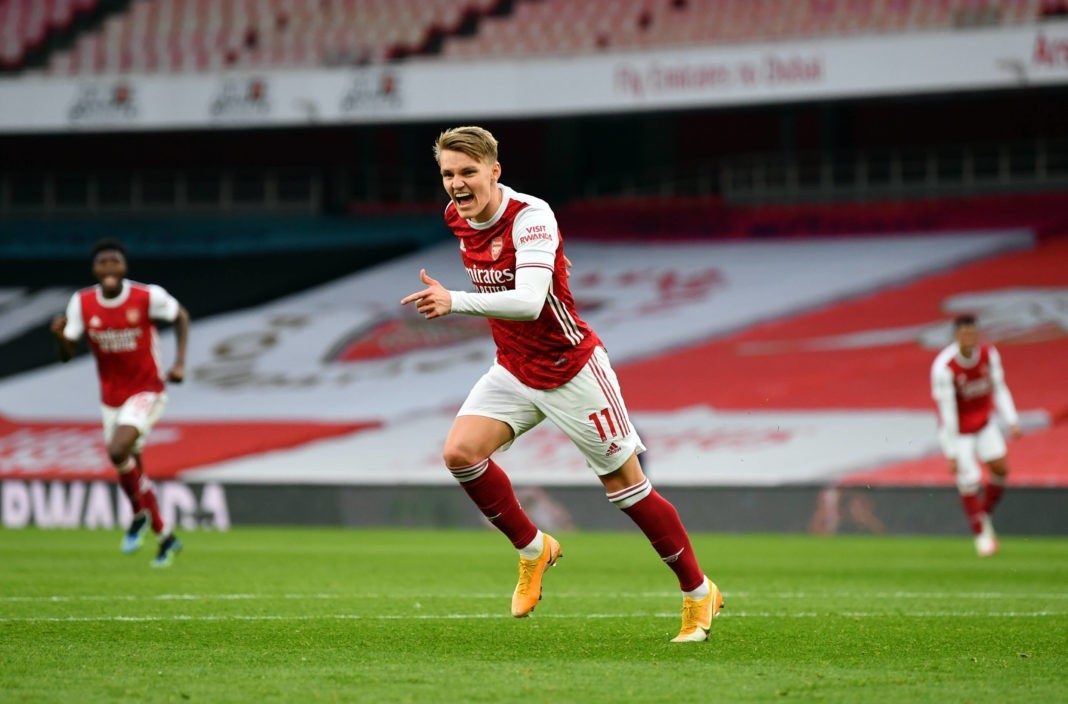 Martin Odegaard celebrates scoring Arsenal's first goal of the game against Spurs during the Premier League match at Emirates Stadium, London. Picture date: Sunday March 14, 2021. Copyright: Nick Potts