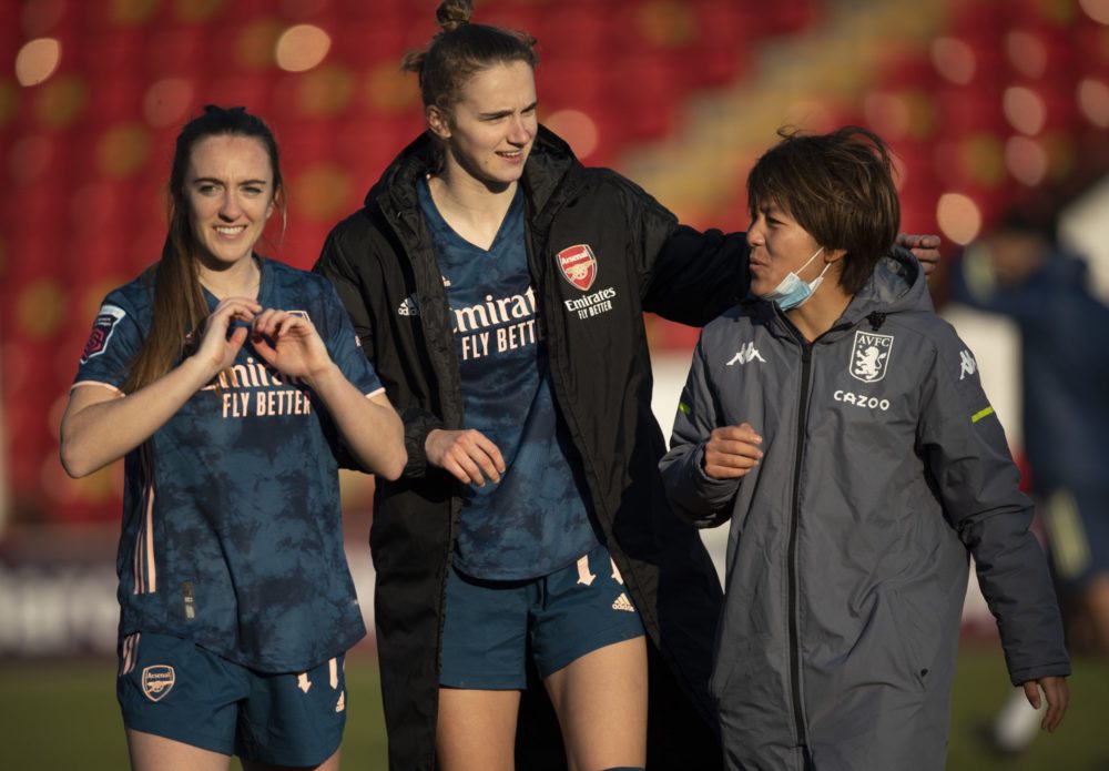 WALSALL, ENGLAND - FEBRUARY 28: Lisa Evans and Vivianne Miedema of Arsenal chat with Mana Iwabuchi of Aston Villa after the Barclays FA Women's Super League match between Aston Villa Women and Arsenal Women at Banks's Stadium on February 28, 2021 in Walsall, England. Sporting stadiums around the UK remain under strict restrictions due to the Coronavirus Pandemic as Government social distancing laws prohibit fans inside venues resulting in games being played behind closed doors. (Photo by Visionhaus/Getty Images)