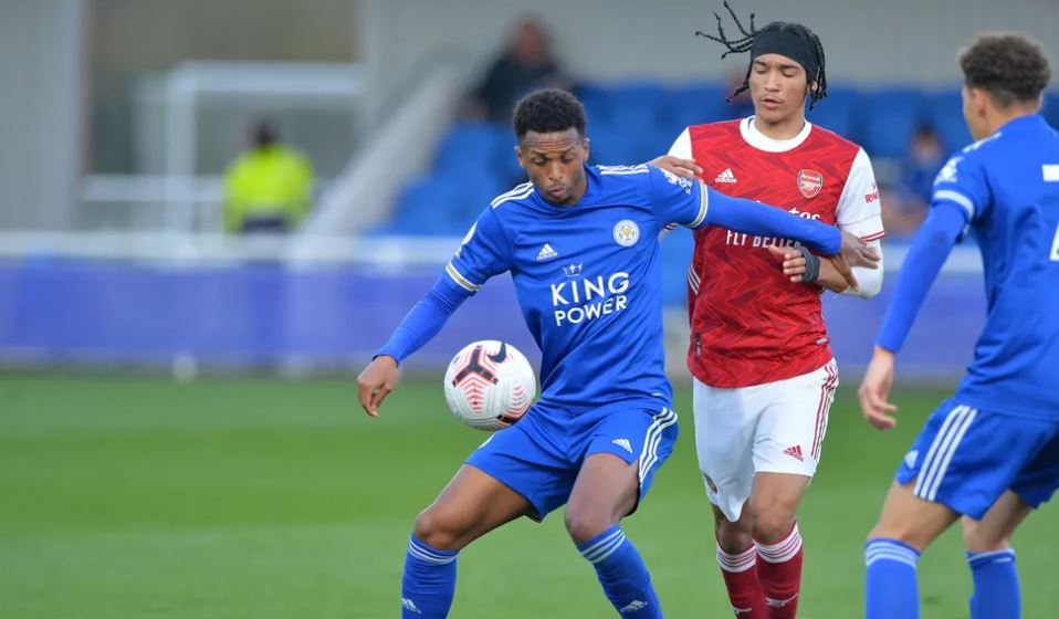 Sidnei Tavares shields the ball from Arsenal's Kido Taylor-Hart in the first half. (Photo via LCFC.com)