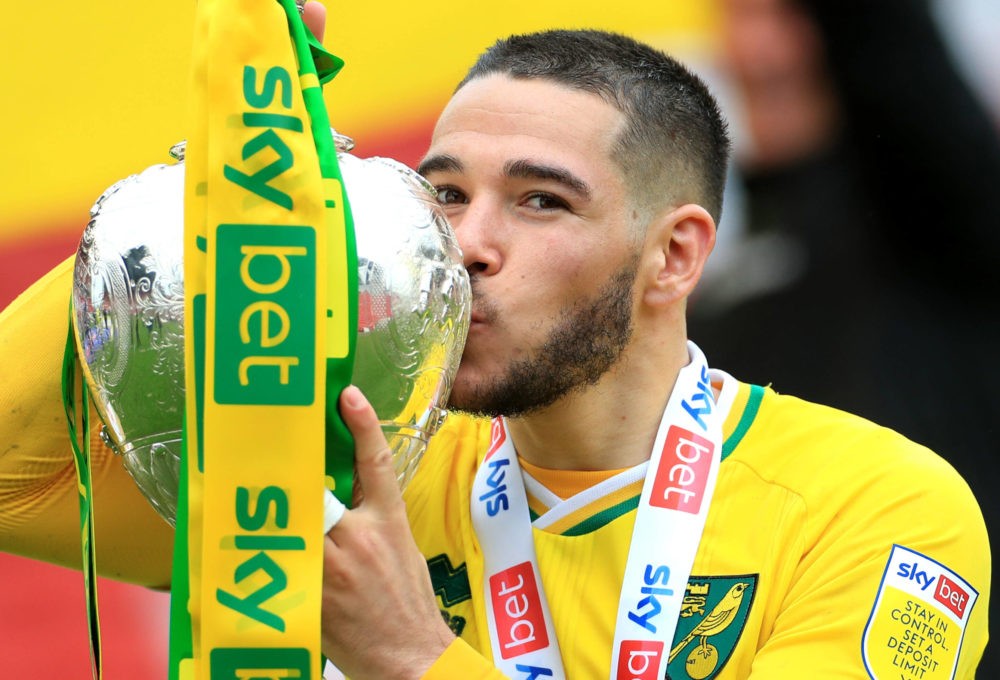 Norwich City's Emi Buendia celebrates with the trophy after the Sky Bet Championship match at Oakwell Stadium, Barnsley. Picture date: Saturday, May 8, 2021. Copyright: Mike Egerton