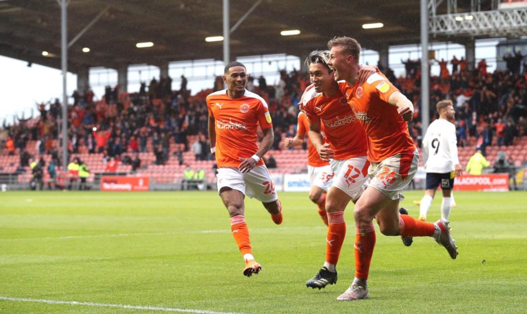 Daniel Ballard (R) celebrates a goal in Blackpool's play-off semi-final (Photo via Ballard on Twitter)