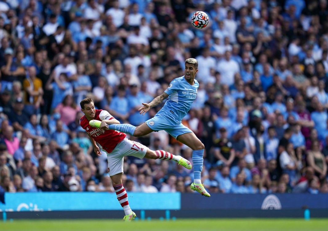 Arsenal transfers - Manchester City v Arsenal - Premier League - Etihad Stadium Arsenals Cedric Soares left and Manchester City s Joao Cancelo battle for the ball in the air during the Premier League match at the Etihad Stadium, Manchester. Picture date: Saturday August 28, 2021. Copyright: Nick Potts