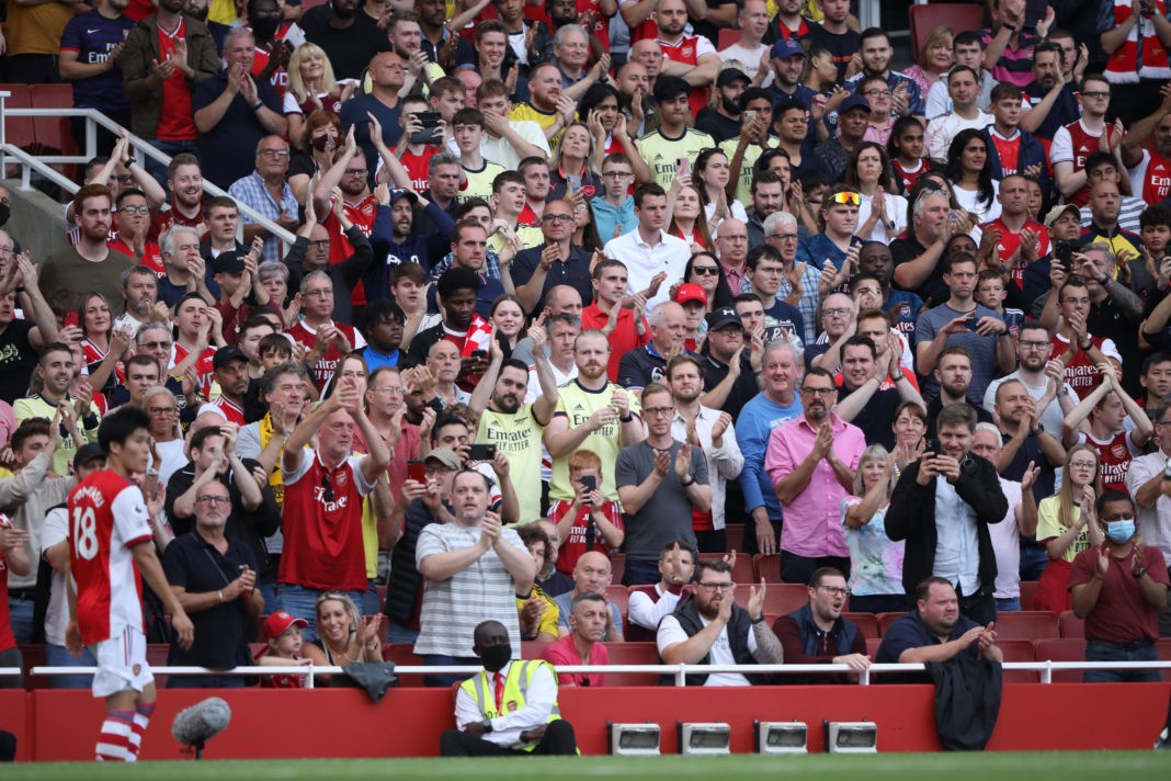Arsenal fans applaud Takehiro Tomiyasu A at the EPL match Arsenal v Norwich City, at the Emirates Stadium, London, UK on 11th September, 2021.