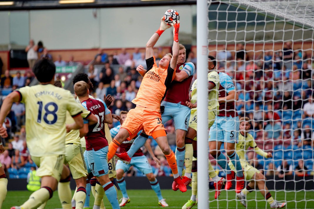 Arsenal goalkeeper Aaron Ramsdale 32 claims a corner under pressure during the Premier League match between Burnley and Arsenal at Turf Moor, Burnley, England on 18 September 2021. Burnley Turf Moor Lancashire England Copyright: Simon Davies