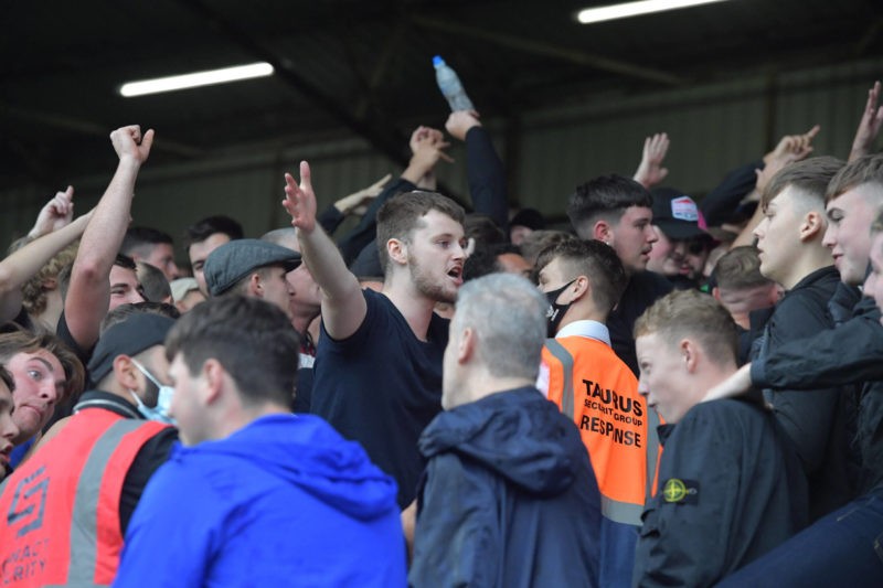 Trouble breaks out at full time between Arsenal left and Burnley right supporters following the Premier League match at Turf Moor, Burnley Copyright: Russell Hart