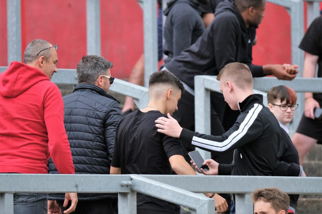 Catalin Cirjan taking photos with fans in the stands before the Arsenal u23s' pre-season friendly against Ebbsfleet United (Photo by Dan Critchlow)