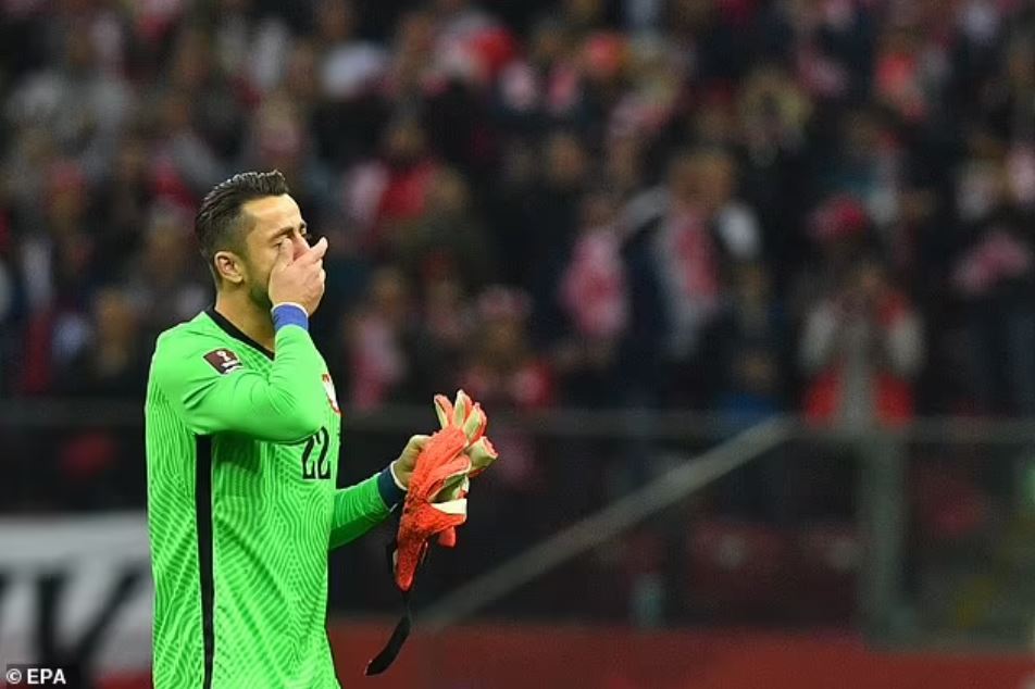 Lukasz Fabianski in tears following his substitution in his final game for Poland (Photo via EPA)