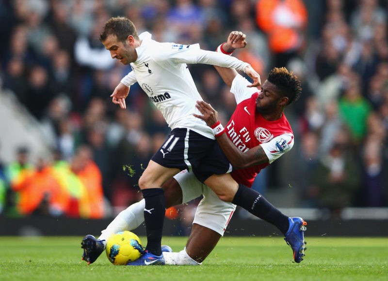 LONDON, ENGLAND - FEBRUARY 26: Alex Song of Arsenal tackles Rafael van der Vaart of Tottenham Hotspur during the Barclays Premier League match between Arsenal and Tottenham Hotspur at Emirates Stadium on February 26, 2012 in London, England. (Photo by Clive Mason/Getty Images)
