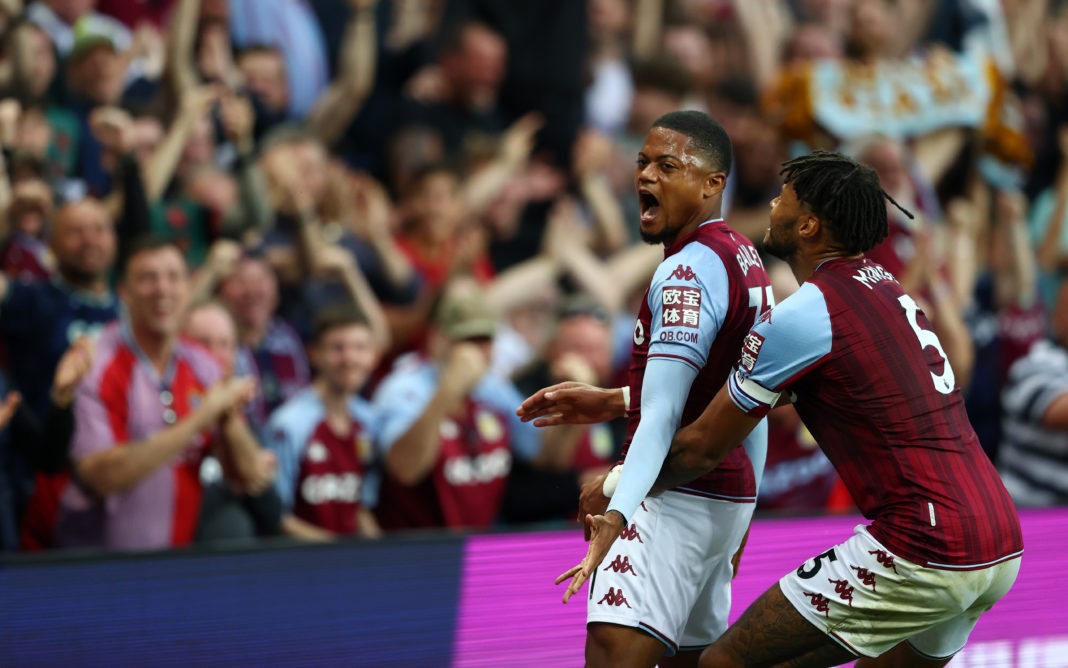 BIRMINGHAM, ENGLAND: Leon Bailey of Aston Villa is congratulated by Tyrone Mings after his corner-kick led to their team's second goal, an own goal scored by Lucas Digne of Everton (not pictured), during the Premier League match between Aston Villa and Everton at Villa Park on September 18, 2021. (Photo by Michael Steele/Getty Images)