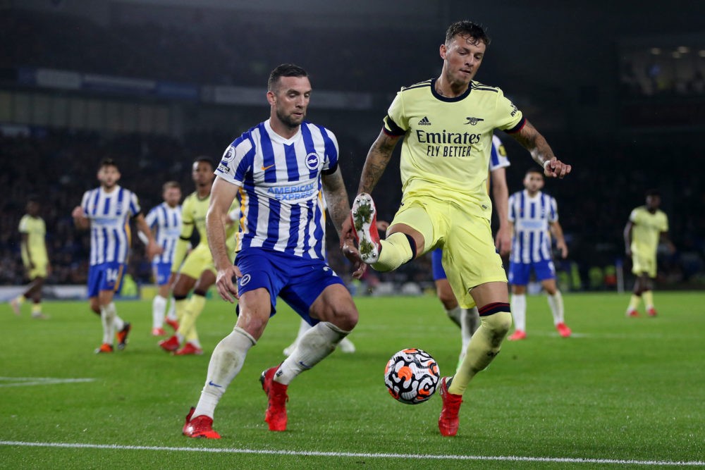BRIGHTON, ENGLAND: Ben White of Arsenal shields the ball from Shane Duffy of Brighton & Hove Albion during the Premier League match between Brighton & Hove Albion and Arsenal at American Express Community Stadium on October 02, 2021. (Photo by Steve Bardens/Getty Images)